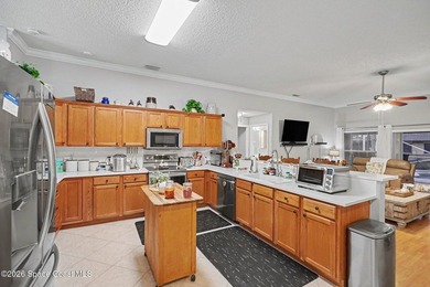 Discover this beautiful 4-bedroom, 2-bath POOL home located in - photo 6