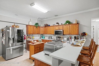 Discover this beautiful 4-bedroom, 2-bath POOL home located in - photo 7