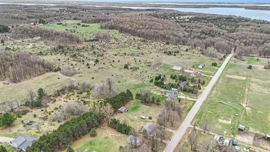 Embrace the pinnacle of Northern Michigan living with this rare - photo 3