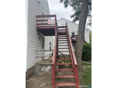 Opportunity knocks! This upper-level end-unit condo in Stamford - photo 5
