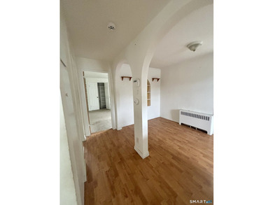 Opportunity knocks! This upper-level end-unit condo in Stamford - photo 10