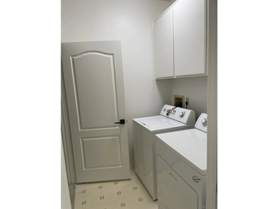 End unit in a private and quiet location overlooking trees in - photo 11