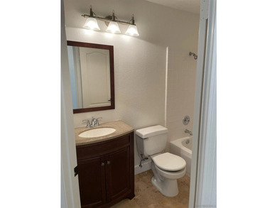 End unit in a private and quiet location overlooking trees in - photo 13