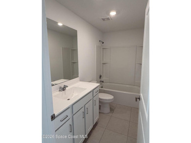 Built in 2024, this 3-bedroom, 2-bath home offers a 2-car garage - photo 5