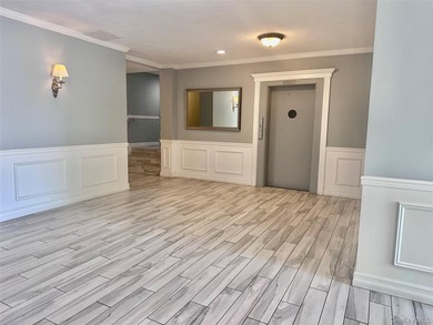 Welcome to Heritage House, Unit 1A with a front balcony! This - photo 13