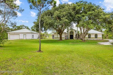 Rare 9.43-acre pool home in Grant! this property blends - photo 1