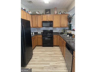 Welcome to this well maintained condominium featuring abundant - photo 4