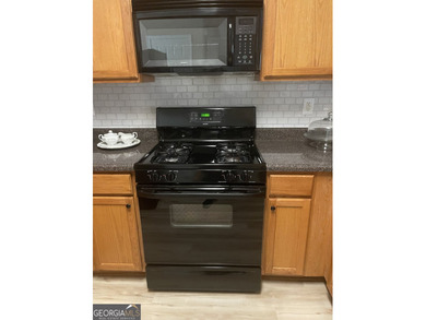 Welcome to this well maintained condominium featuring abundant - photo 5