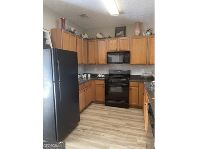 Welcome to this well maintained condominium featuring abundant - photo 6