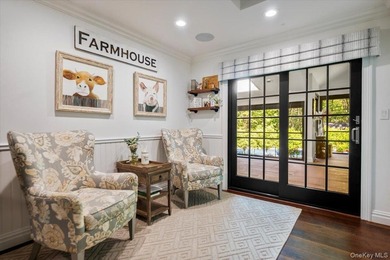 Nestled on two private, professionally landscaped acres in the - photo 11