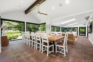 Nestled on two private, professionally landscaped acres in the - photo 12