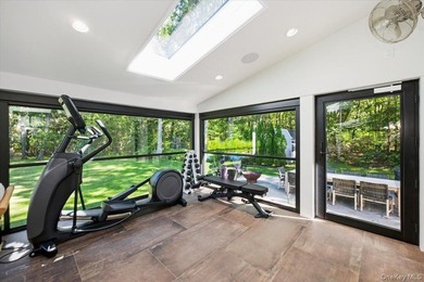 Nestled on two private, professionally landscaped acres in the - photo 15