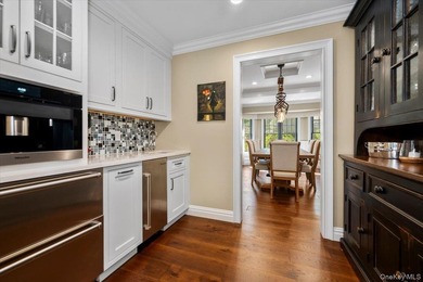 Nestled on two private, professionally landscaped acres in the - photo 16
