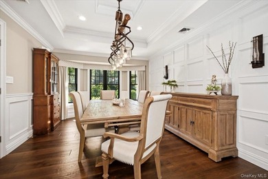 Nestled on two private, professionally landscaped acres in the - photo 17
