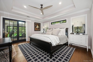 Nestled on two private, professionally landscaped acres in the - photo 21