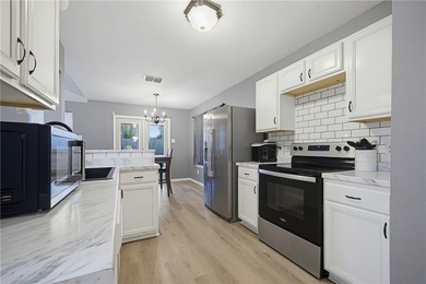 Welcome to this beautiful 3-bedroom, 2-bath home located in the - photo 8