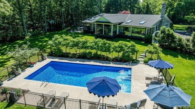 Nestled on two private, professionally landscaped acres in the - photo 30