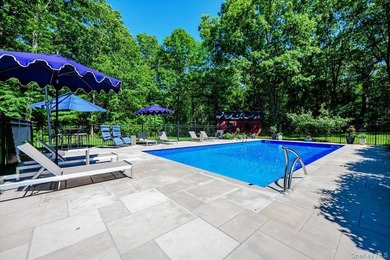 Nestled on two private, professionally landscaped acres in the - photo 31