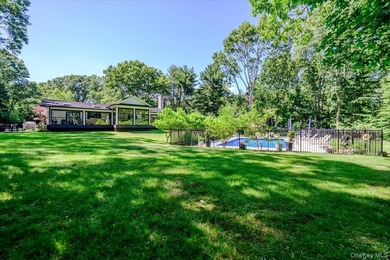 Nestled on two private, professionally landscaped acres in the - photo 33