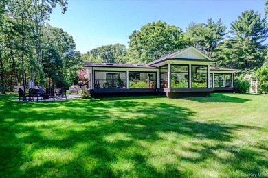Nestled on two private, professionally landscaped acres in the - photo 34