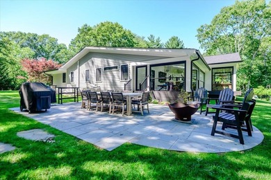 Nestled on two private, professionally landscaped acres in the - photo 35