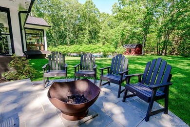 Nestled on two private, professionally landscaped acres in the - photo 36