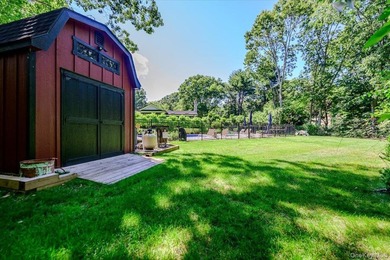 Nestled on two private, professionally landscaped acres in the - photo 37