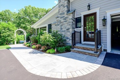Nestled on two private, professionally landscaped acres in the - photo 39