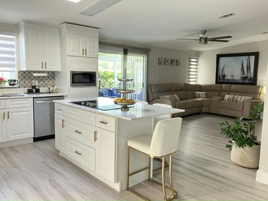 Beautifully remodeled 3BR/2BA home in a vibrant 55+ active - photo 3