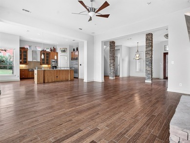 Experience elevated living in the prestigious gated community of - photo 4