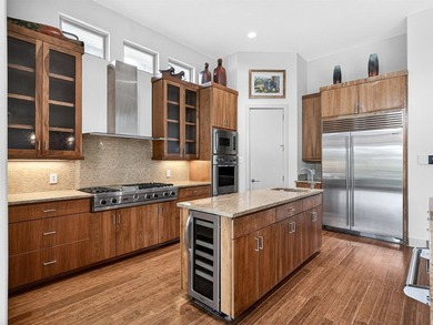 Experience elevated living in the prestigious gated community of - photo 6