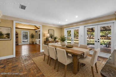Set on 2.36 acres shaded by beautiful oak trees, this Gulfport - photo 15