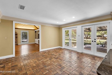 Set on 2.36 acres shaded by beautiful oak trees, this Gulfport - photo 16