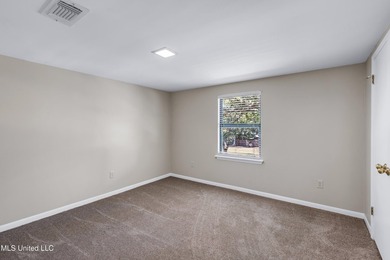 Set on 2.36 acres shaded by beautiful oak trees, this Gulfport - photo 24