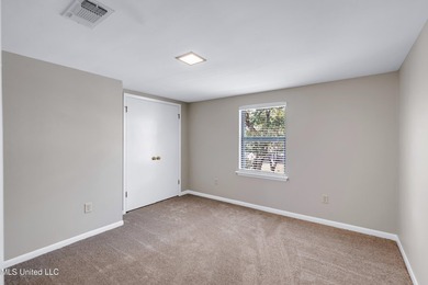 Set on 2.36 acres shaded by beautiful oak trees, this Gulfport - photo 25