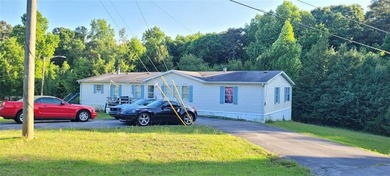 Spacious 4BR/2BA home on .81 acres in Acworth! With over 2,100 - photo 1