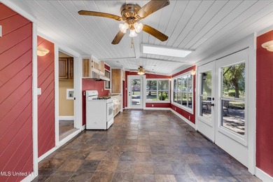 Set on 2.36 acres shaded by beautiful oak trees, this Gulfport - photo 31