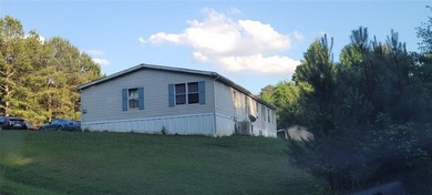 Spacious 4BR/2BA home on .81 acres in Acworth! With over 2,100 - photo 3