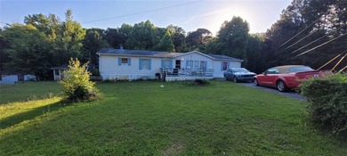 Spacious 4BR/2BA home on .81 acres in Acworth! With over 2,100 - photo 5