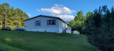 Spacious 4BR/2BA home on .81 acres in Acworth! With over 2,100 - photo 7