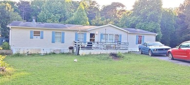 Spacious 4BR/2BA home on .81 acres in Acworth! With over 2,100 - photo 9