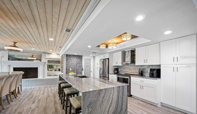 Perfectly positioned within the exclusive waterfront enclave of - photo 46