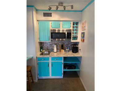 Welcome to Villa Del Sol on North Beach! This condo offers a - photo 3