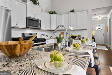 Welcome to Lakeside Garden, a truly one-of-a-kind townhome in - photo 13