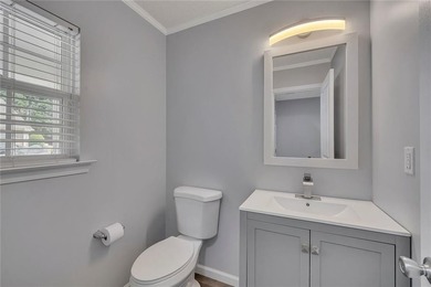 Located in Victoria Crossing, this end-unit townhome offers - photo 14