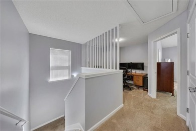 Located in Victoria Crossing, this end-unit townhome offers - photo 15