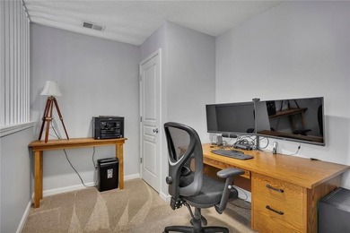 Located in Victoria Crossing, this end-unit townhome offers - photo 16