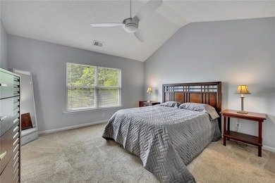 Located in Victoria Crossing, this end-unit townhome offers - photo 17