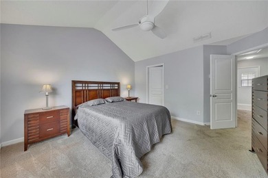 Located in Victoria Crossing, this end-unit townhome offers - photo 18