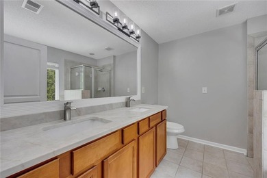 Located in Victoria Crossing, this end-unit townhome offers - photo 21